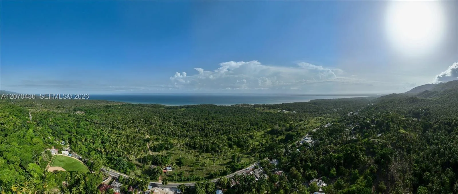 Панорама с холмов на участок и море